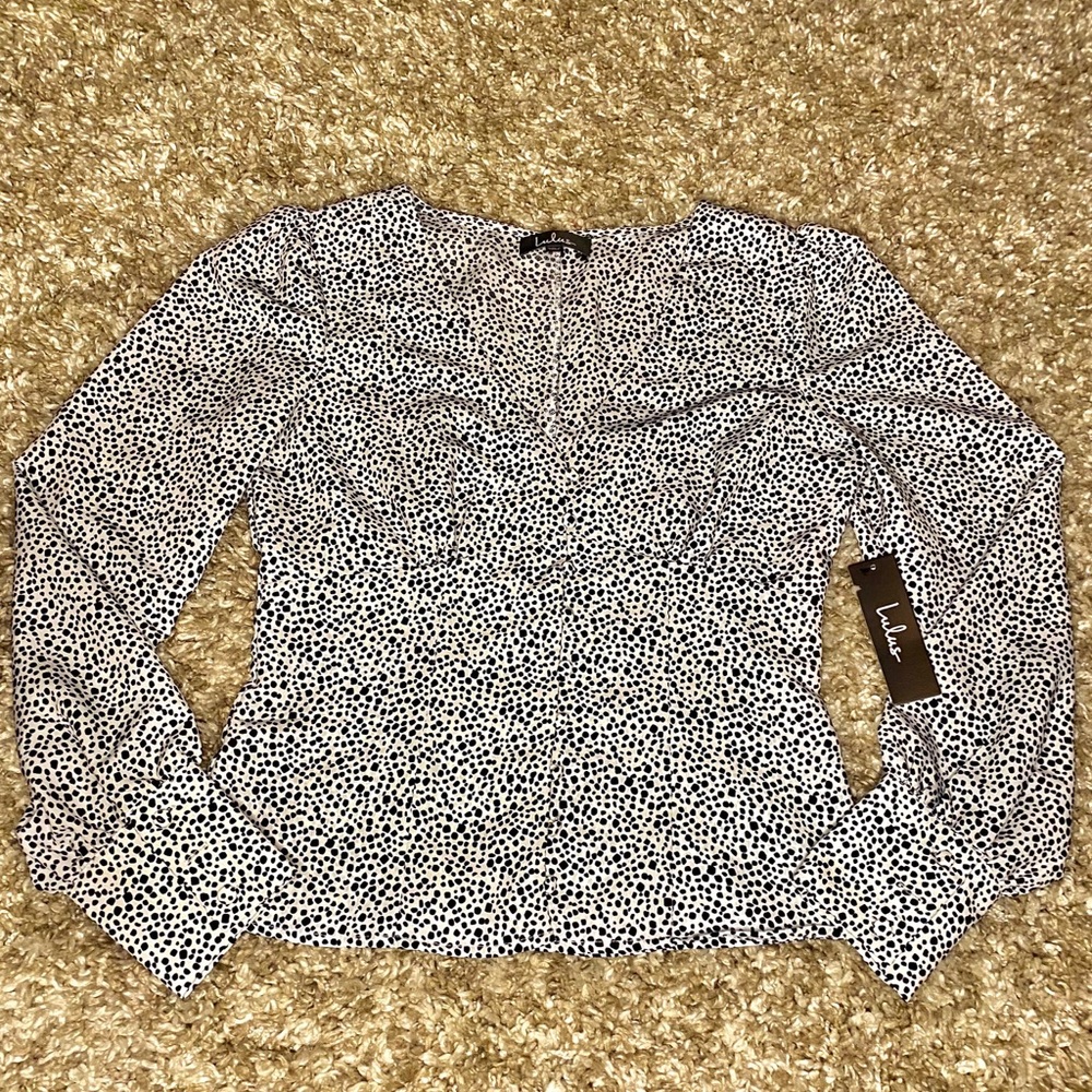 Cheetah Print Long Sleeve Button-Up Top.